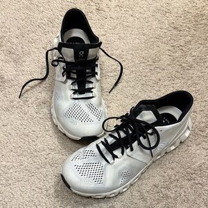 On Running White and Black Performance Sneakers